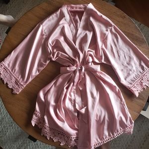Pink silk robe with lace details
